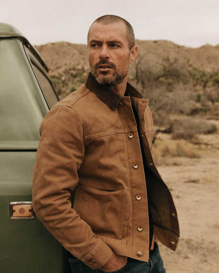 fit model posing in The Ryder Jacket in Tobacco Chipped Canvas