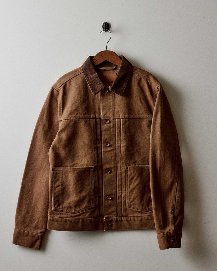 fit model showing off the cuffs on The Ryder Jacket in Tobacco Chipped Canvas