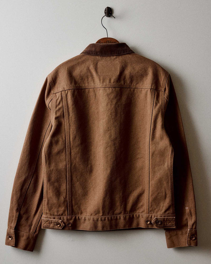 flatlay of the back of The Ryder Jacket in Tobacco Chipped Canvas