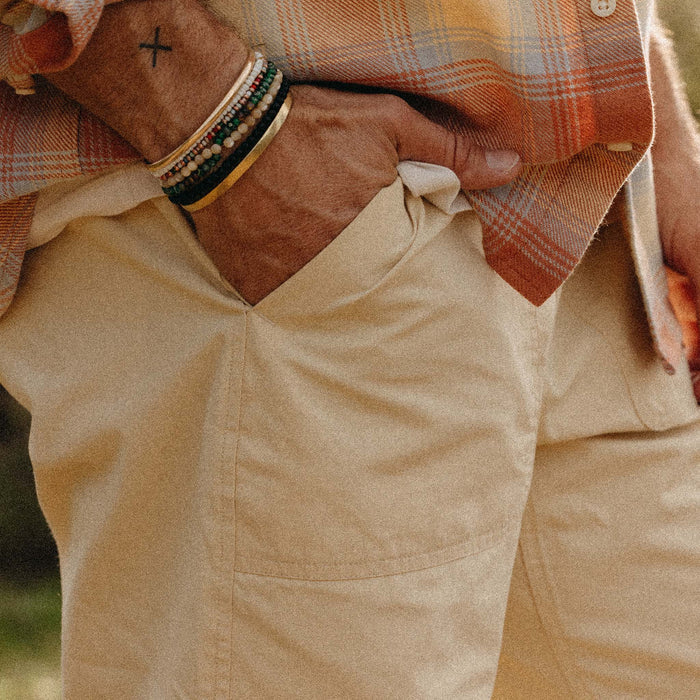 fit model with his hand in the pocket of The Scramble Pant in Boulder