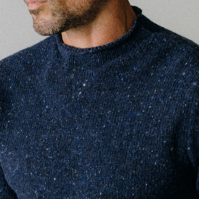 fit model showing off the collar on The Seafarer Sweater in Atlantic Blue Donegal