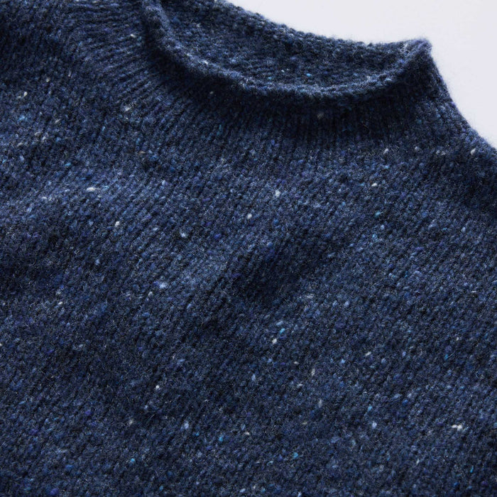 material shot of the collar on The Seafarer Sweater in Atlantic Blue Donegal