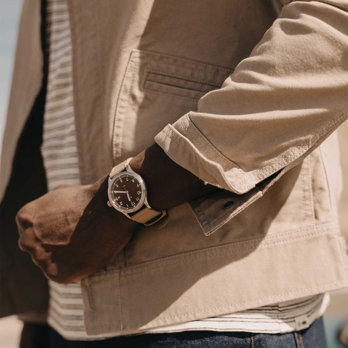 fit model showing off cuffs on The Shifter Jacket in Baked Soil Canvas