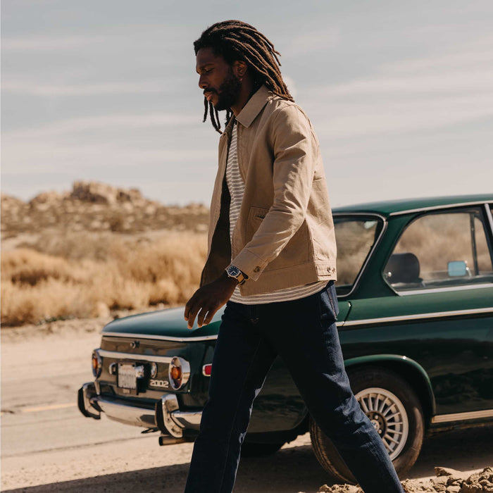 fit model walking wearing The Shifter Jacket in Baked Soil Canvas
