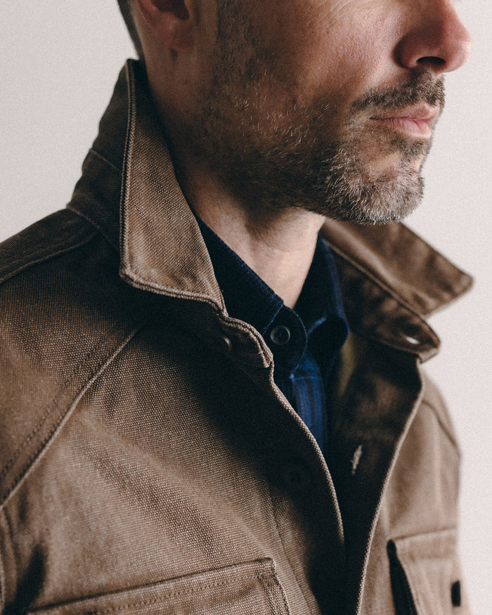 fit model showing off the collar on The Shop Shirt in Aged Penny Chipped Canvas