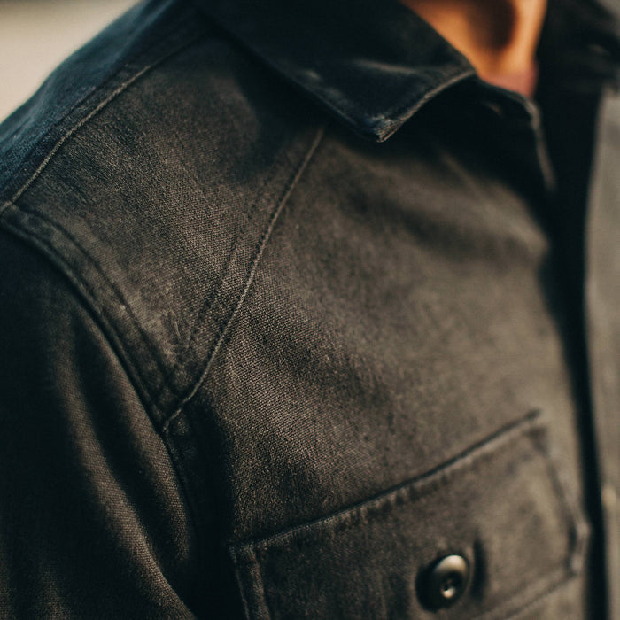fit model wearing The Shop Shirt in Coal Boss Duck, chest detail