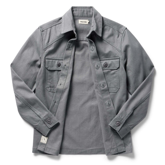 flatlay of The Shop Shirt in Gravel Boss Duck, shown open
