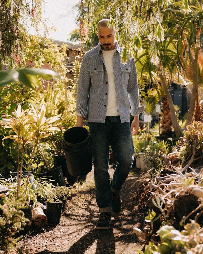 fit model walking wearing The Shop Shirt in Rinsed Indigo Selvedge