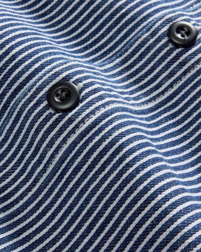 material shot of the buttons on The Shop Shirt in Rinsed Indigo Selvedge
