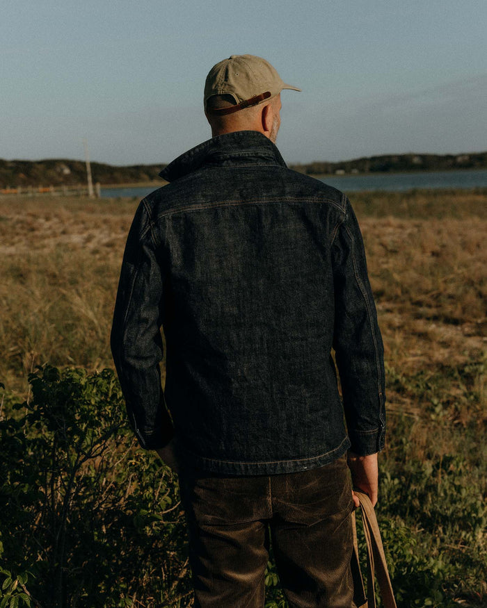 fit model showing off the back of The Shop Shirt in Rinsed Indigo Selvedge