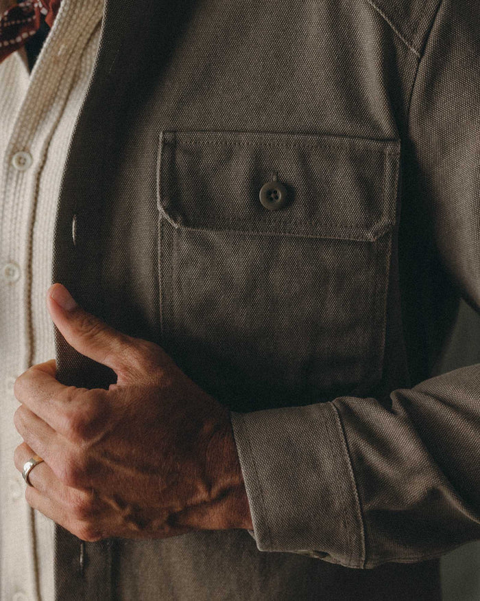 fit model showing off the shoulder on The Shop Shirt in Stone Chipped Canvas