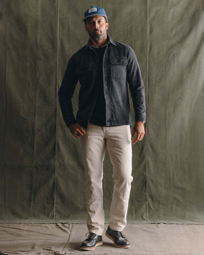 fit model posing in The Shop Shirt in Washed Black Organic Slub Selvedge