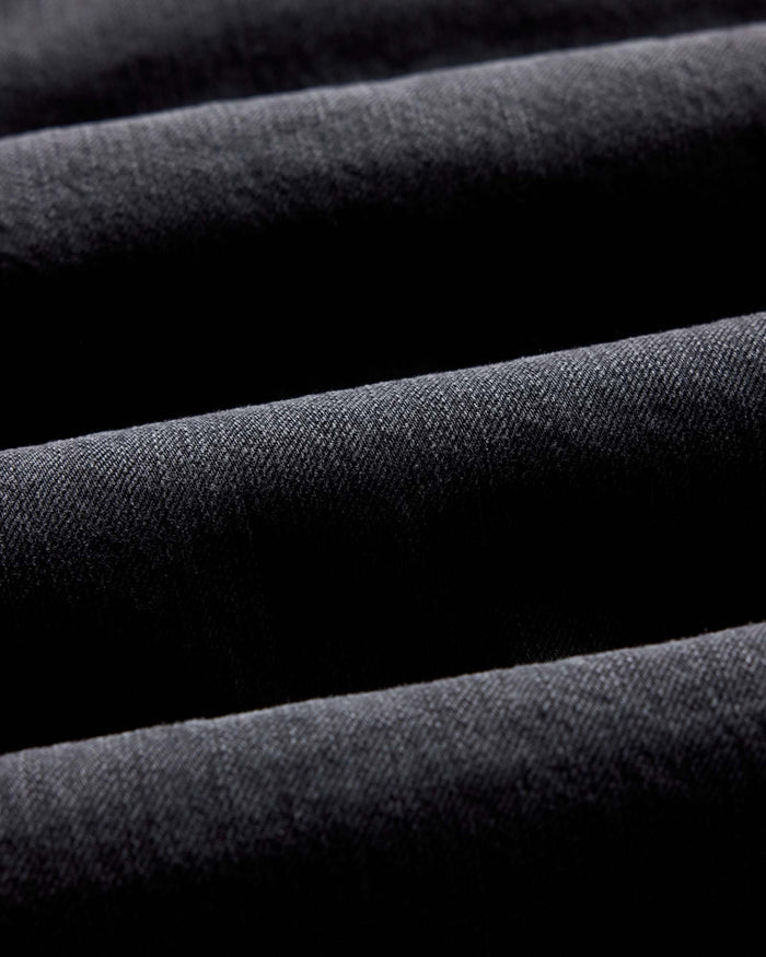 material shot of the fabric on The Shop Shirt in Washed Black Organic Slub Selvedge