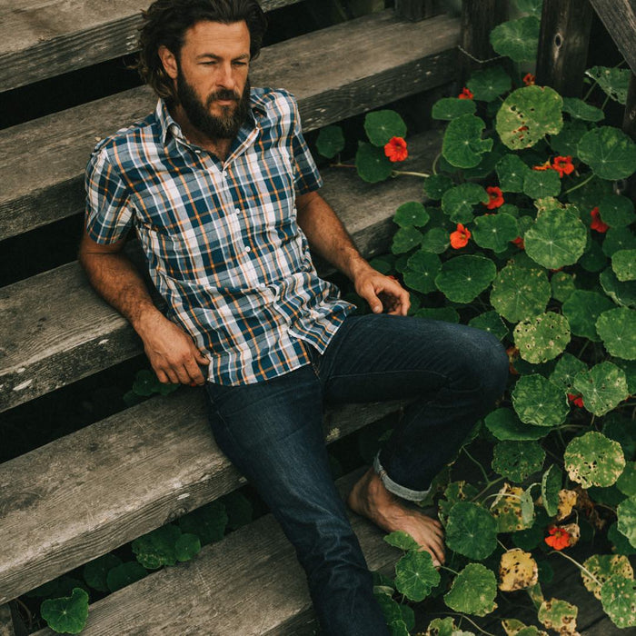 Our fit model in The Short Sleeve California in Blue Madras at a BBQ.