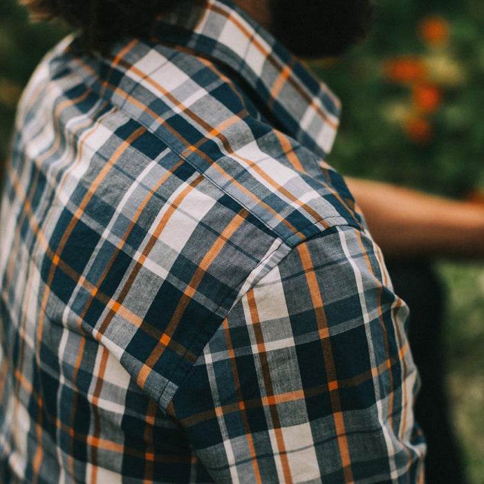 Our fit model in The Short Sleeve California in Blue Madras at a BBQ.