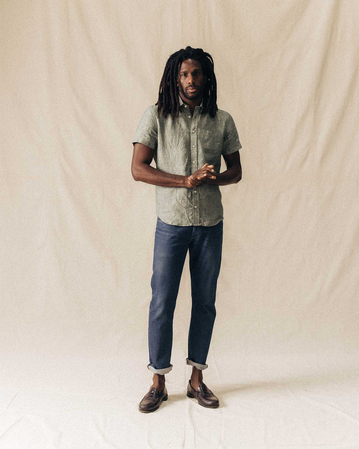 fit model posing in The Short Sleeve California in Cilantro Hemp