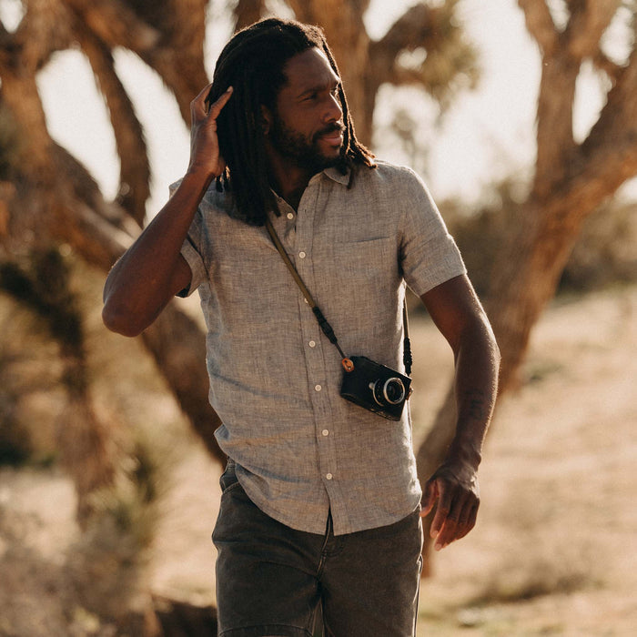 fit model walking wearing The Short Sleeve California in Faded Navy Hemp