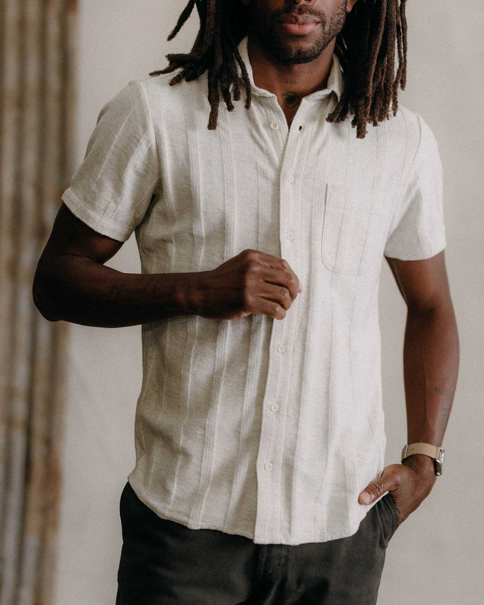 fit model showing off texture on The Short Sleeve California in Heather Ash Pointelle Stripe