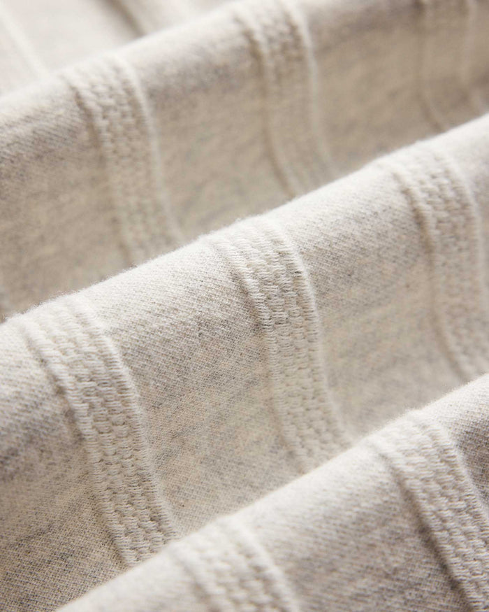 material shot of the fabric on The Short Sleeve California in Heather Ash Pointelle Stripe