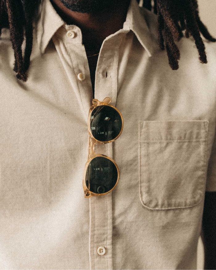 fit model showing off the buttons on The Short Sleeve California in Heather Oat Cord