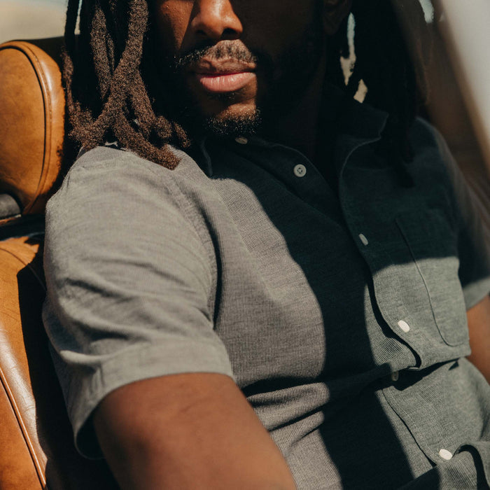 fit model showing off cord details on The Short Sleeve California in Heather Slate Cord