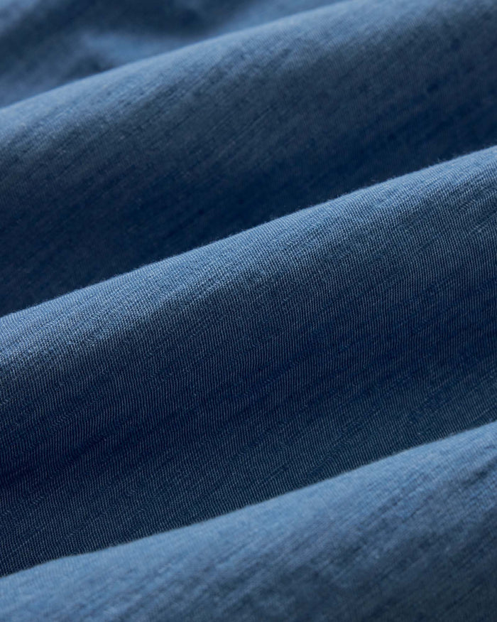 material shot of the buttons on The Short Sleeve California in Washed Indigo Slub