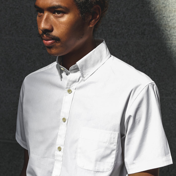 Our fit model in a classic white button down