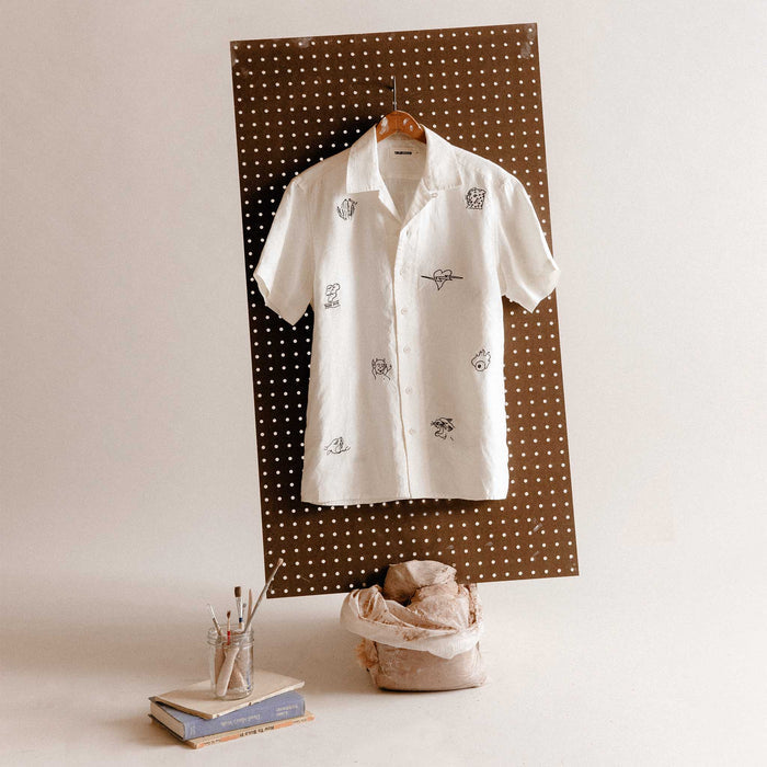 editorial image of The Short Sleeve Davis Shirt in Embroidered Natural hanging