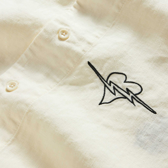 material shot of the buttons on The Short Sleeve Davis Shirt in Embroidered Natural
