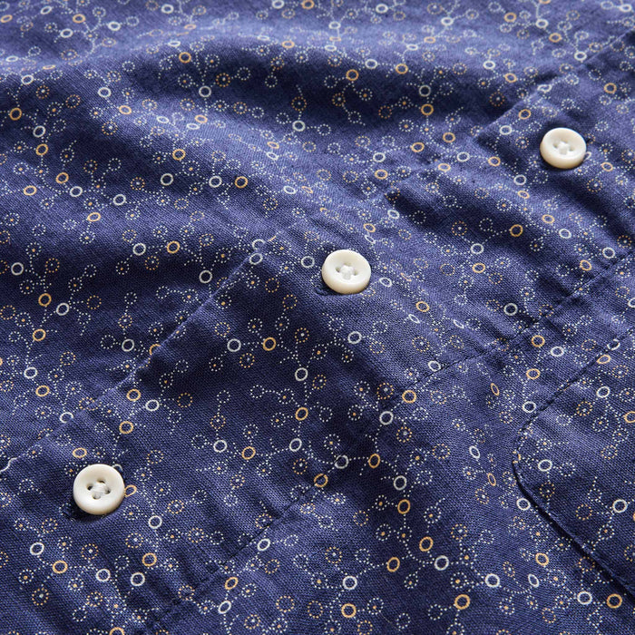 material shot of the buttons on The Short Sleeve Hawthorne in Dark Navy Floral