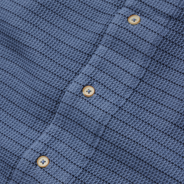 material shot of the buttons on The Short Sleeve Hawthorne in Ocean Pickstitch Waffle