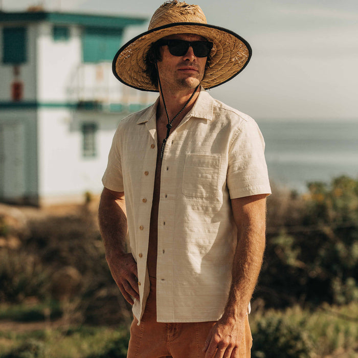 fit model wearing The Short Sleeve Hawthorne in Sand unbuttoned