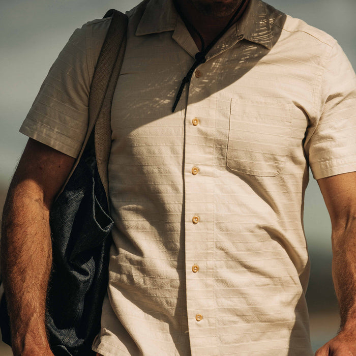 fit model wearing The Short Sleeve Hawthorne in Sand buttoned