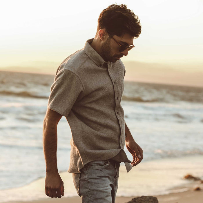 Our fit model at the beach on a windy day
