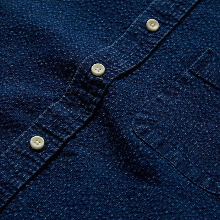 material shot of the buttons on The Short Sleeve Jack in Indigo Seersucker