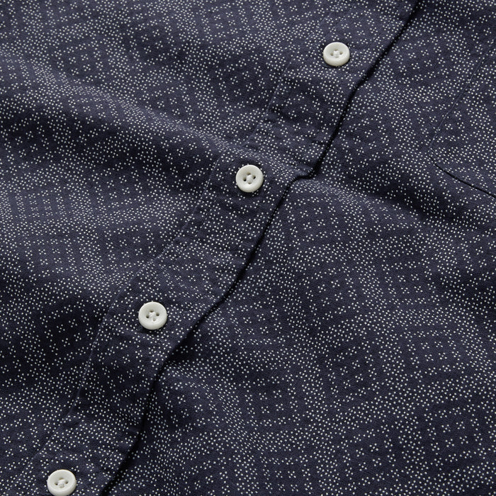 material shot of the buttons on The Short Sleeve Jack in Navy Diamond