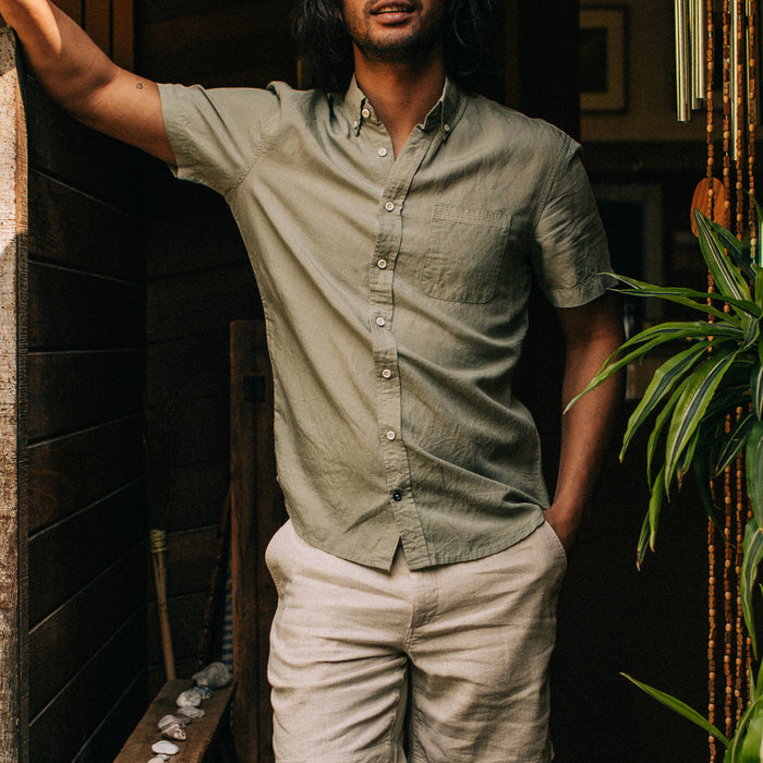 fit model posing in The Short Sleeve Jack in Sage and Natural