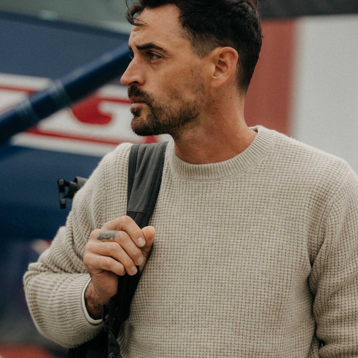 fit model posing in The Sidecountry Crew in Heather Fog Merino Waffle