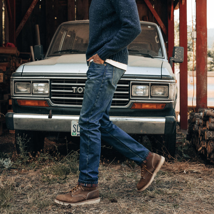 fit model walking in The Slim Brushed Back Jean in Sawyer Wash Organic Selvage
