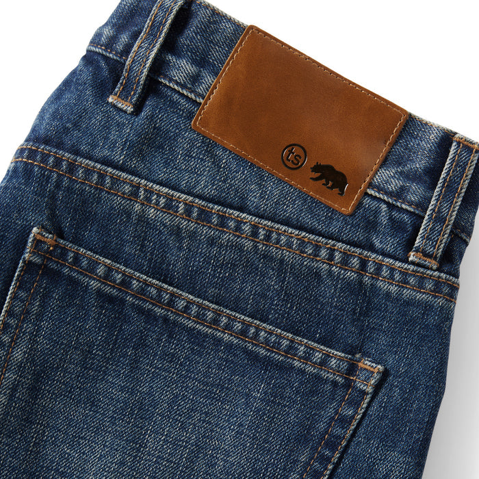 material shot of the leather logo panel on The Slim Brushed Back Jean in Sawyer Wash Organic Selvage