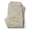 folded flatlay of The Slim Foundation Pant in Organic Stone