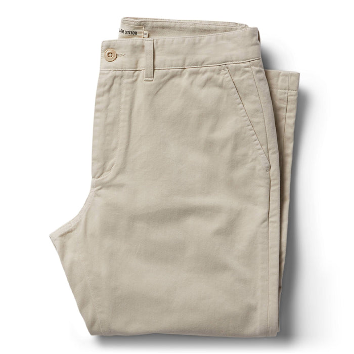 folded flatlay of The Slim Foundation Pant in Organic Stone