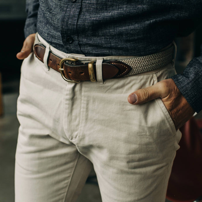fit model with hands in pockets of The Slim Foundation Pant in Organic Stone