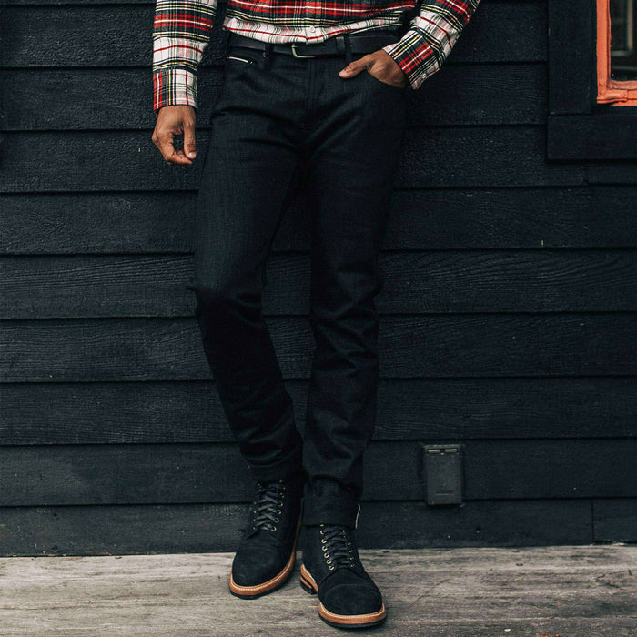 our fit model wearing The Slim Jean in Black Selvage