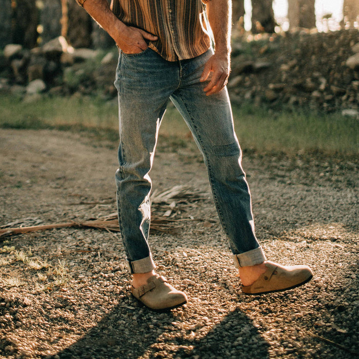 fit model walking in The Slim Jean in Patch Wash Selvage