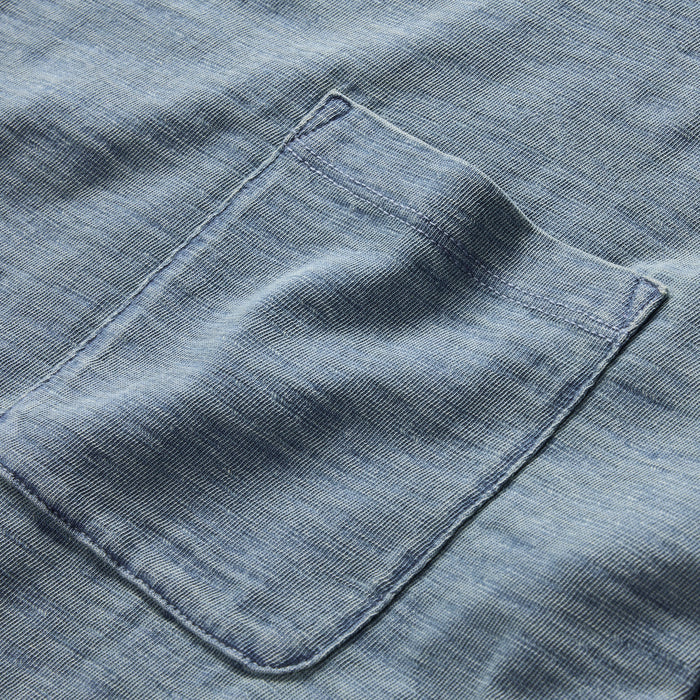 material shot of the front chest pocket on The Organic Cotton Tee in Dyed Indigo