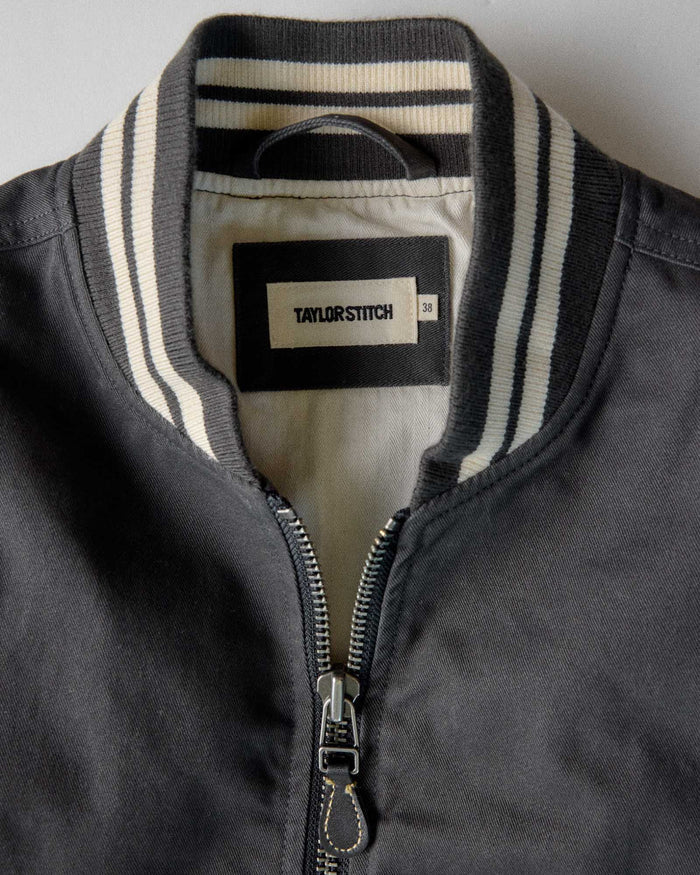material shot of the collar on The Speedway Bomber in Organic Faded Black Twill