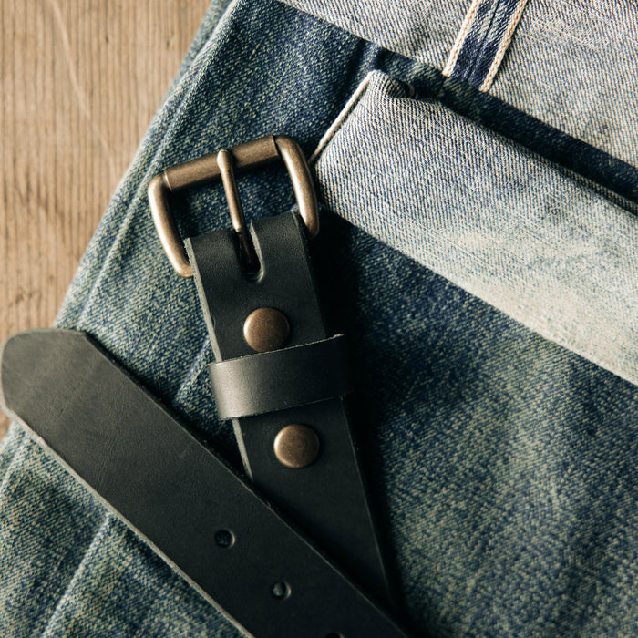 material shot of the rivets on The Standard Belt in Black