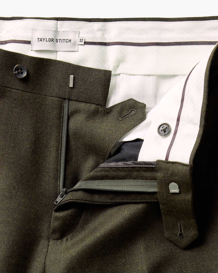 material shot of the zipper fly on The Stevens Trouser in Black Olive Wool Flannel