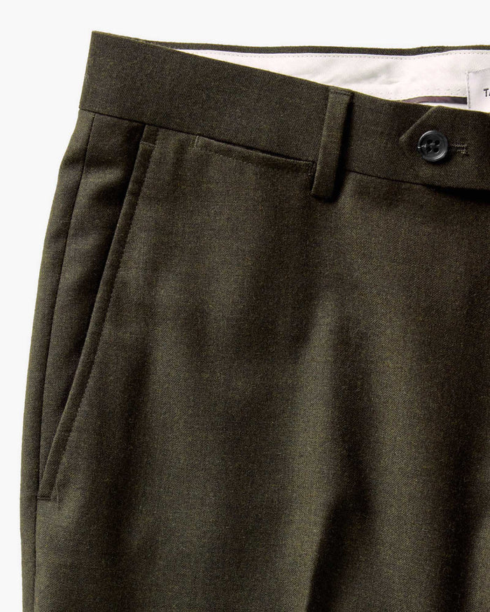 material shot of the pocket on The Stevens Trouser in Black Olive Wool Flannel